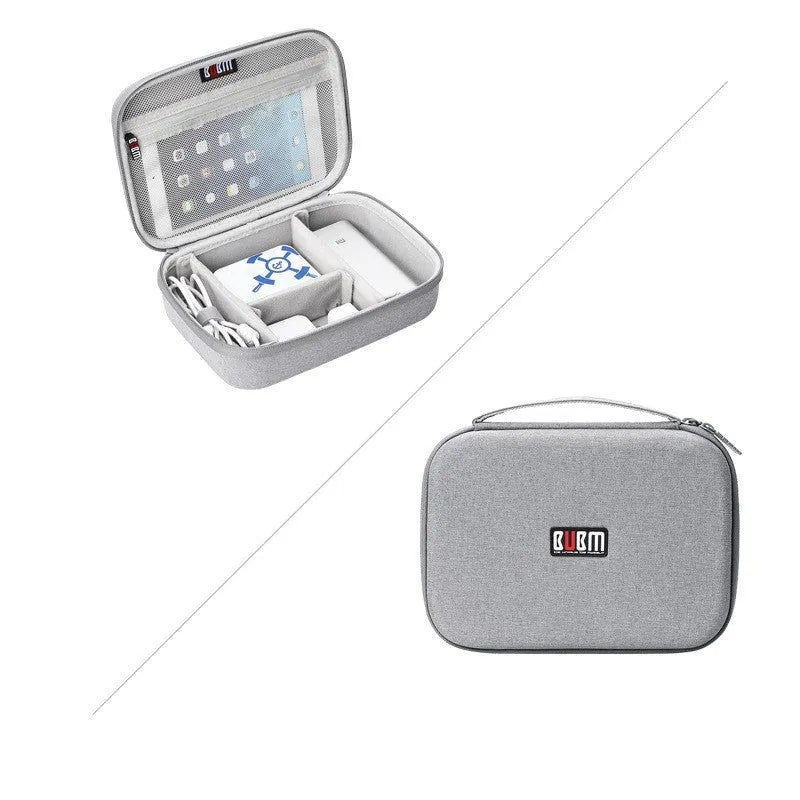 Black EVA digital storage bag with headset storage compartments open showing organisation for cables and accessories