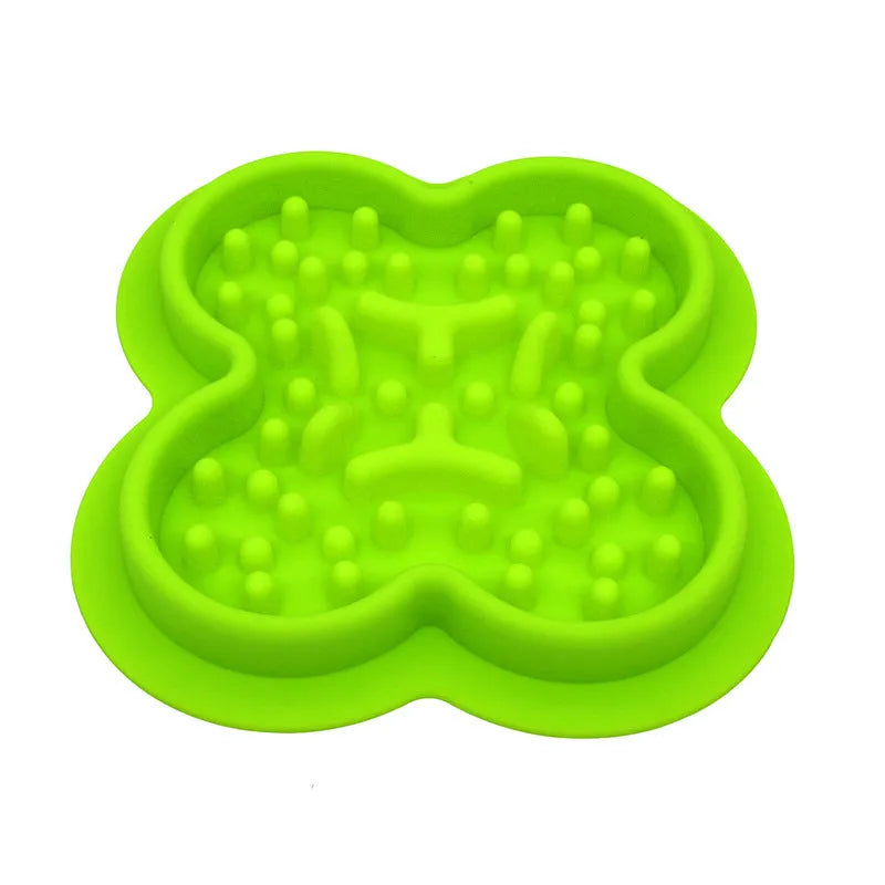 A blue silicone pet licking mat with a textured surface and non-slip base for slow feeding cats and dogs.