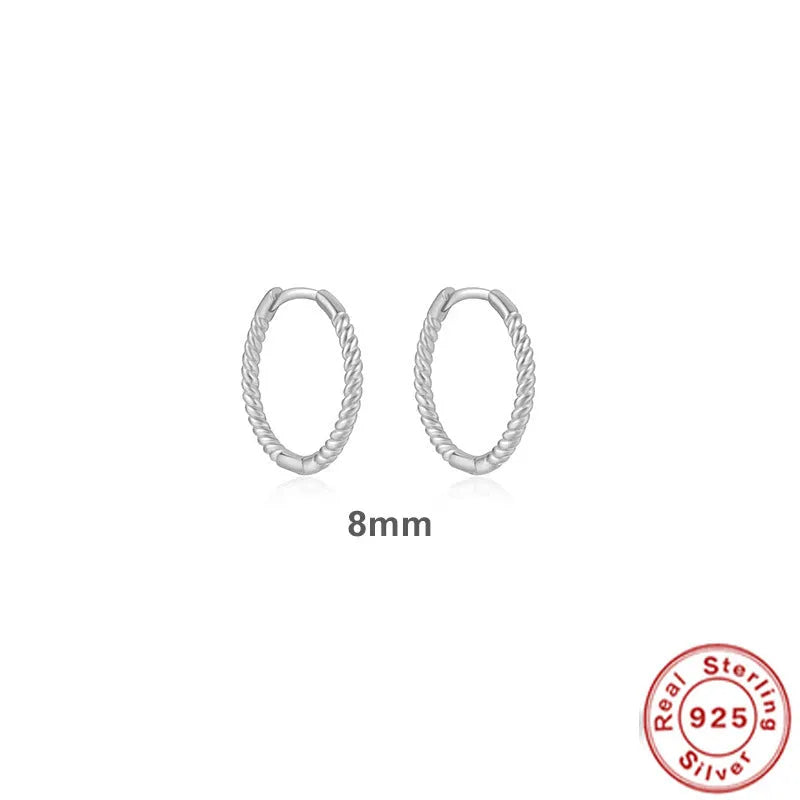 Sterling silver twisted hoop earrings with geometric round shape in gold electroplated finish