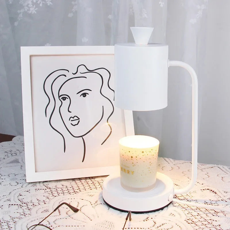 European-style white metal aromatherapy wax melting lamp with dimmer switch on table.