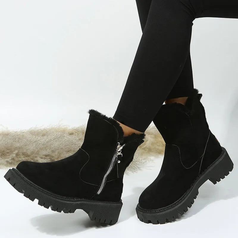 Women's black thick plush snow boot with side zip and faux fur lining