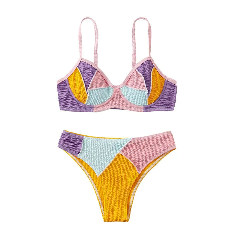 Women's spliced colour push-up bikini set with steel bracket support and matching shorts.