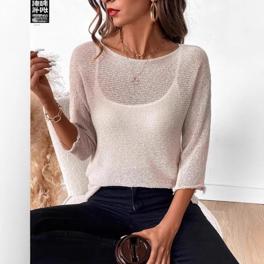 Women's knitted off-shoulder top with 3D pattern in lavender purple colour showing 3/4 sleeve detail
