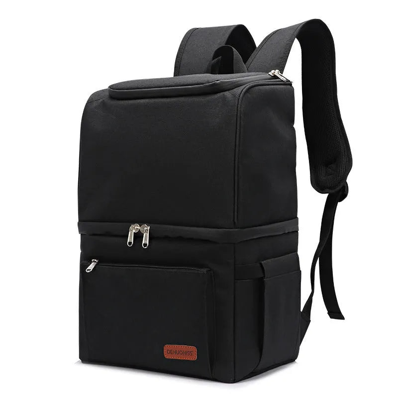 Blue double-layer insulated waterproof backpack cooler with 22 litre capacity shown outdoors.