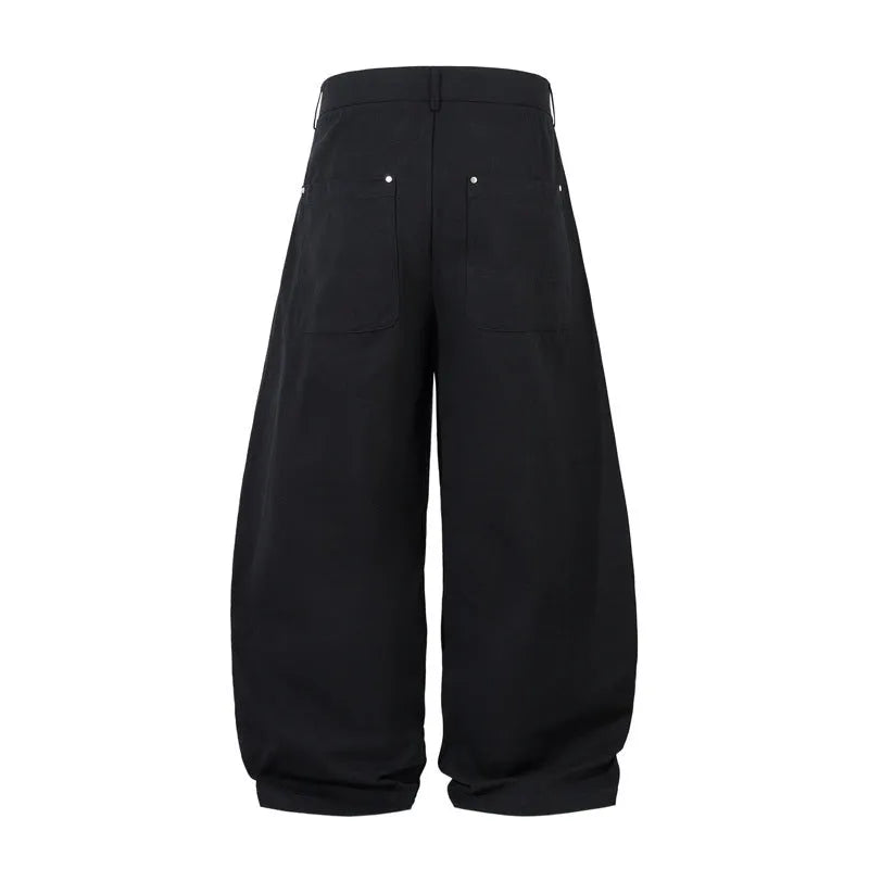 Men's black pleated machete casual trousers with loose-fitting wide-leg design and cotton fabric
