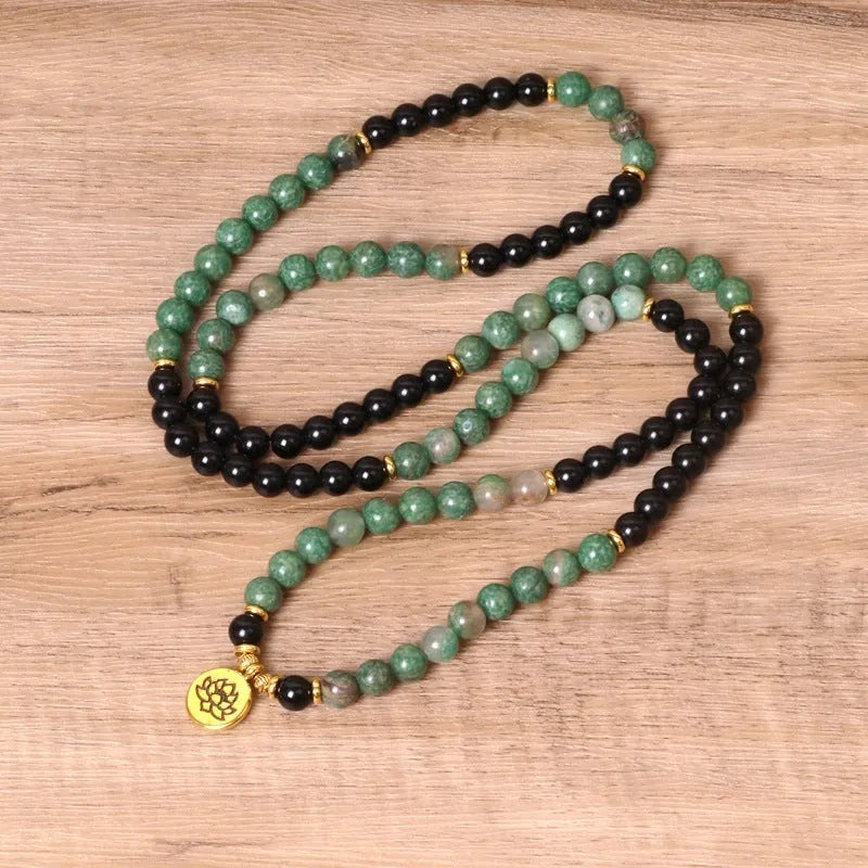 Green and black alloy elastic beaded bracelet with natural style design
