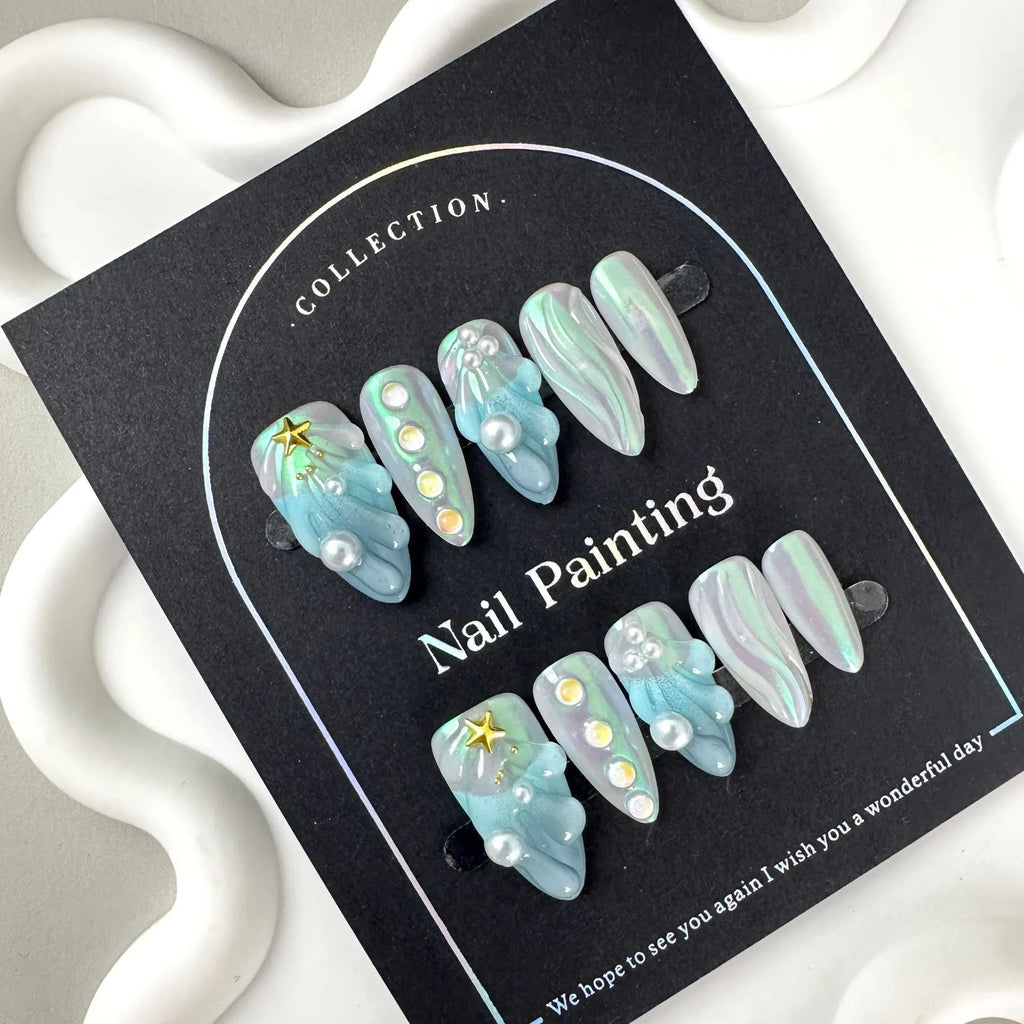 Blue plastic nail tip shells in four sizes for nail extensions and decorative manicures