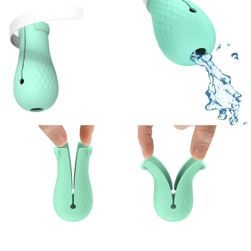 Four green silicone anti-scratch gloves designed to cover a cat's paws.
