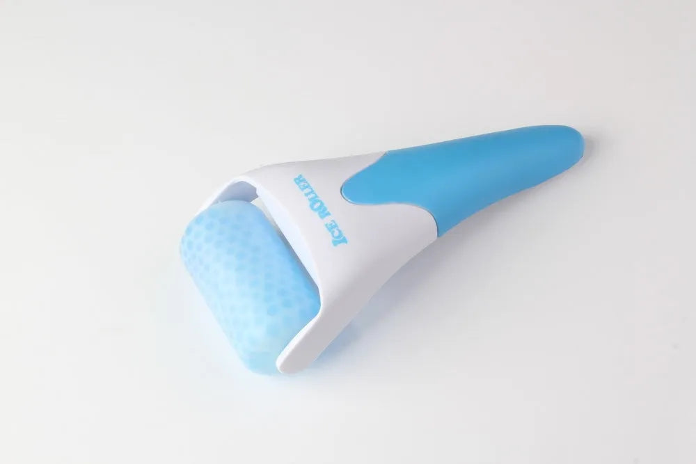 Plastic ice roller face roller in blue with removable head on white background