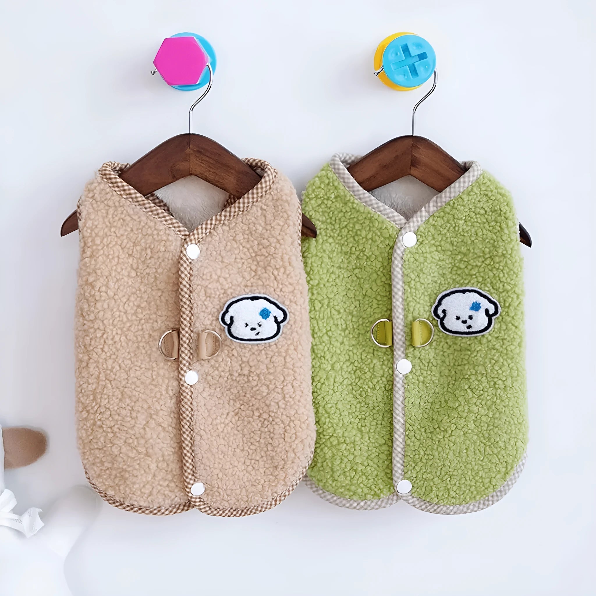 Green coral fleece dog sweatshirt vest with a leash ring on a small dog, showing a winter outfit.