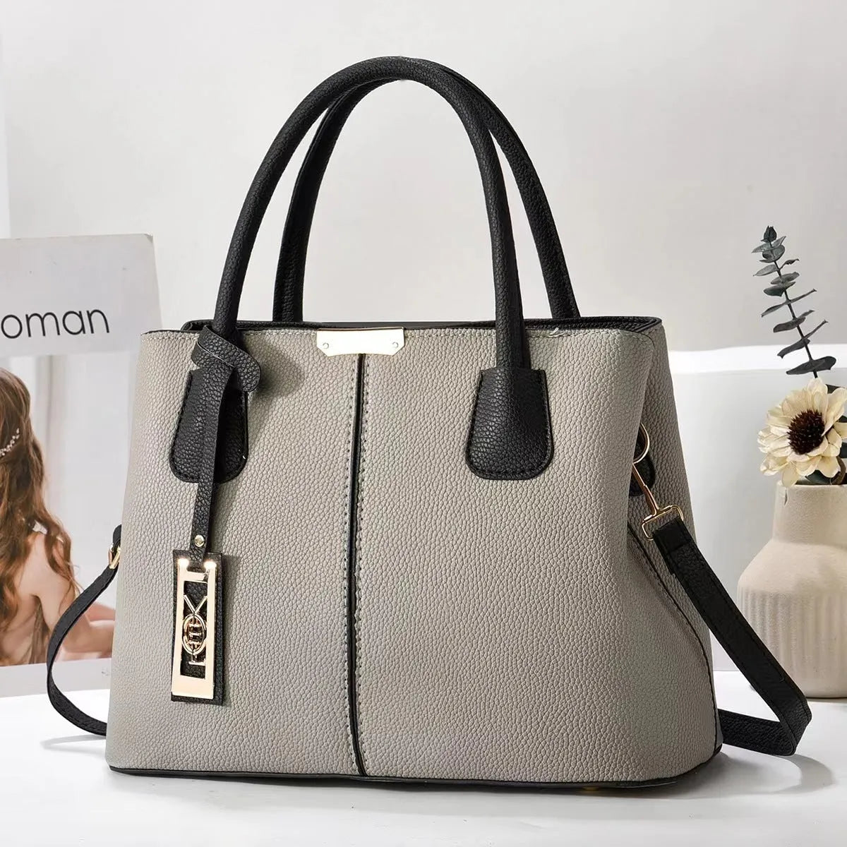 Soft PU women's shoulder bag in horizontal square shape with leather strap, available in multiple colours