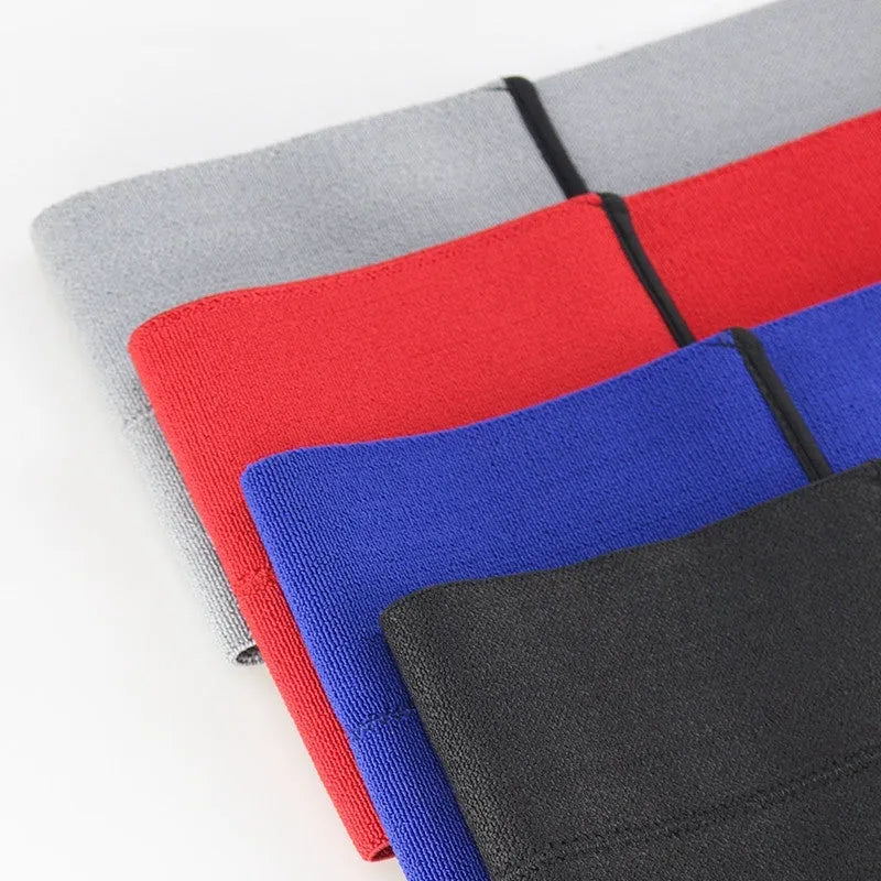 Elastic elbow support bandage for sports, shown in various colours: red, grey, blue, and black.