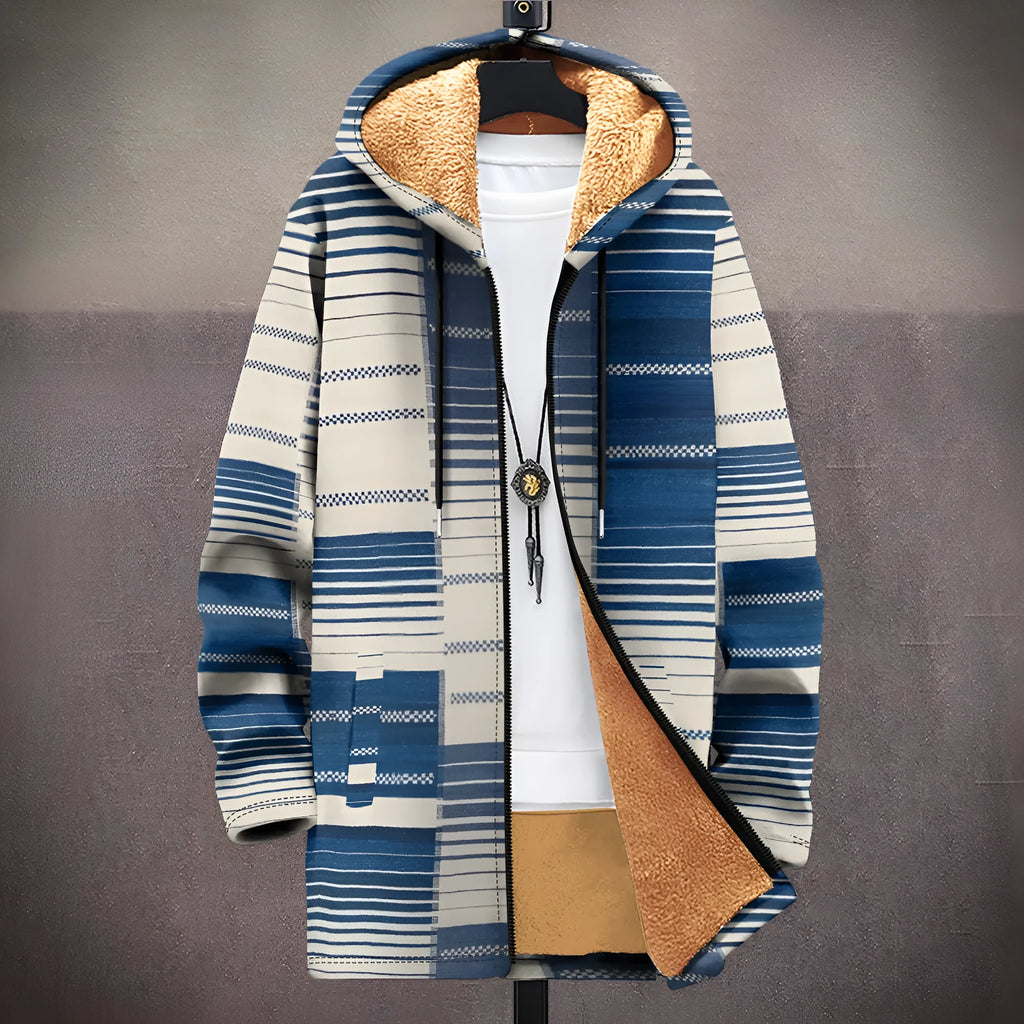 Man wearing a loose fit, multicolour print hooded cardigan with a front zipper.