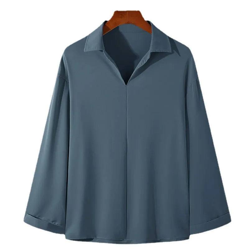 Men's loose fit lapel casual shirt in a solid colour with long sleeves.