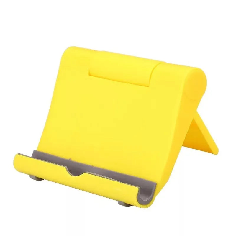 PE folding mobile phone stand in multiple colours showing multi-angle adjustment for tablets and smartphones