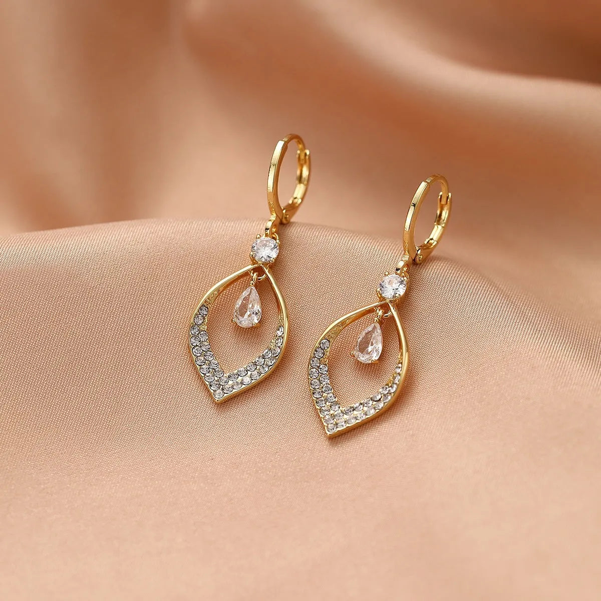 Women's gold and silver zircon water drop tassel earrings made from electroplated copper