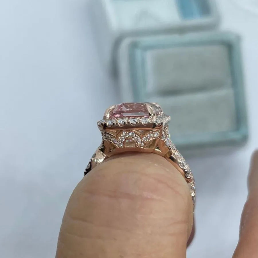 Geometric rose gold alloy ring showing straight edges and angular design