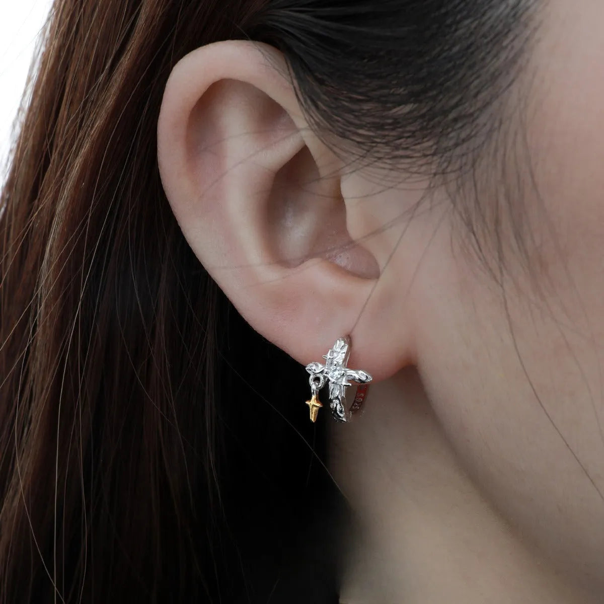 Geometric cross earrings in 925 sterling silver with white gold colour finish featuring round design elements