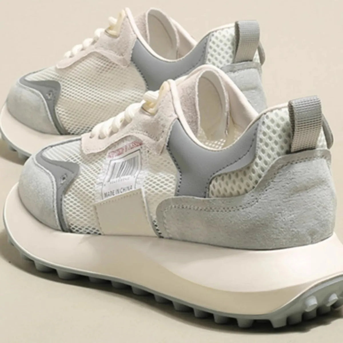Women's grey and pink retro casual sneakers with mesh lining and rubber sole, low-top design