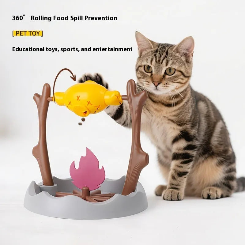 Barbecue-style tumbling interactive cat feeder toy with food compartments, 30cm cube.