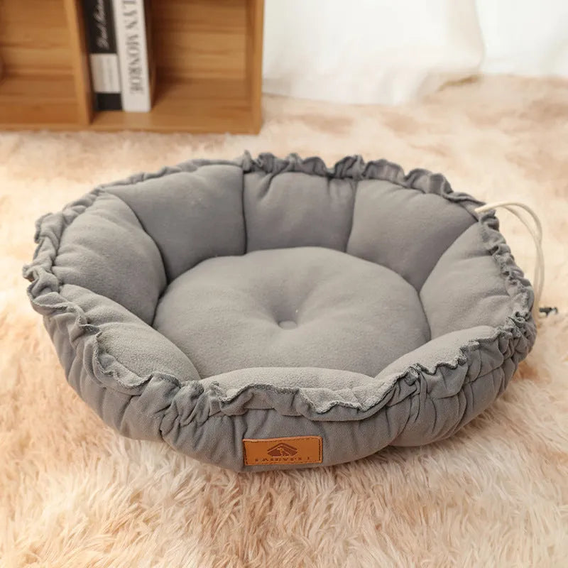 Grey and green reversible donut-shaped pet bed for cats and small dogs, shown in small, medium, and large sizes.