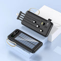 Black and white solar power bank showing its built-in solar panel and USB port.