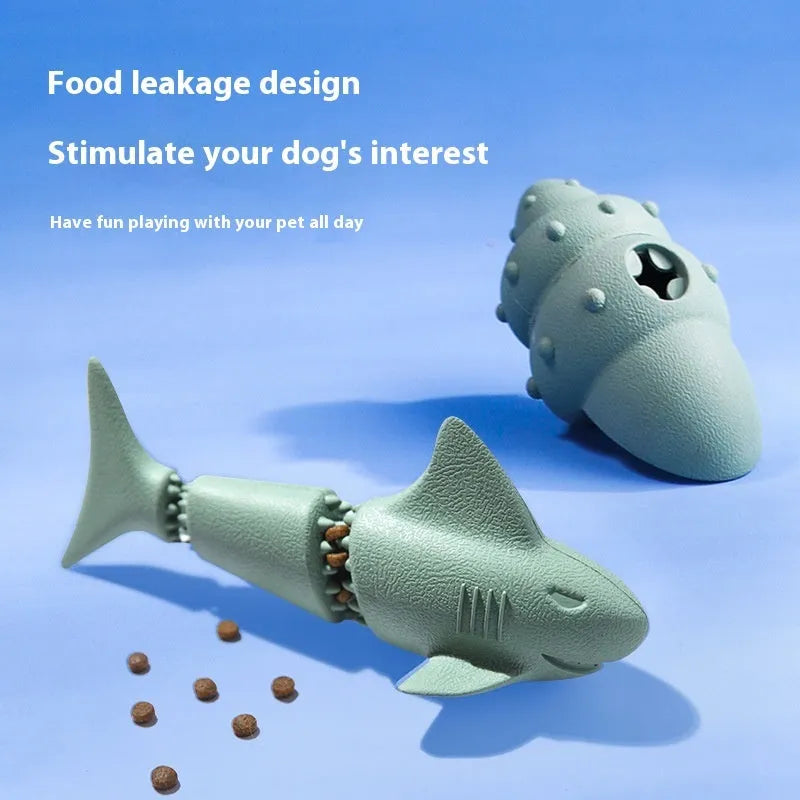 Blue rubber dog toy shaped like a shark conch for food dispensing and chewing.