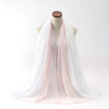 Long lightweight chiffon scarf with bubble towel texture draped to show its length and soft drape.