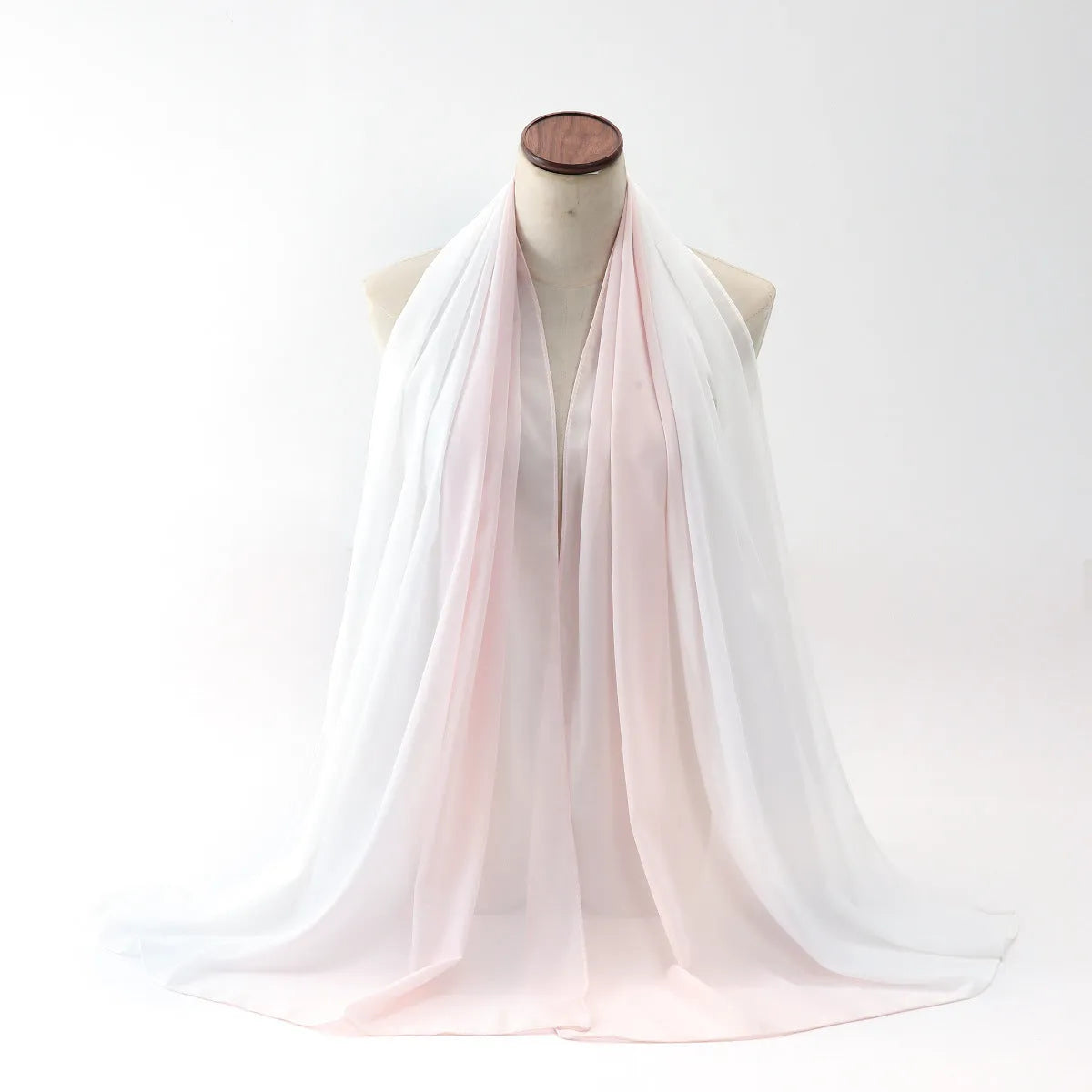 Long lightweight chiffon scarf with bubble towel texture draped to show its length and soft drape.