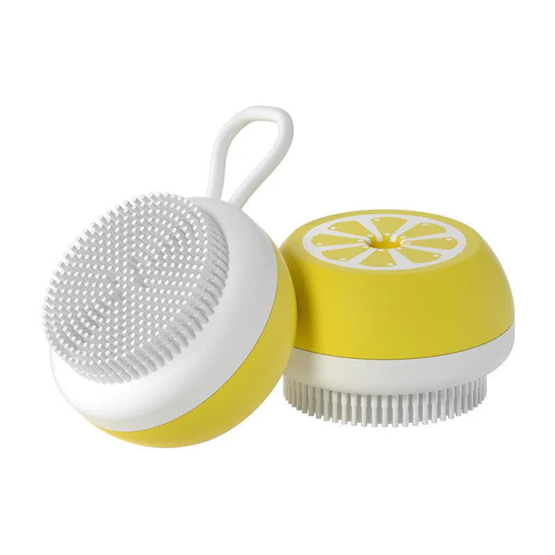 Soft yellow silicone pet bath brush with massage nodes and comb bristles for dog and cat washing.