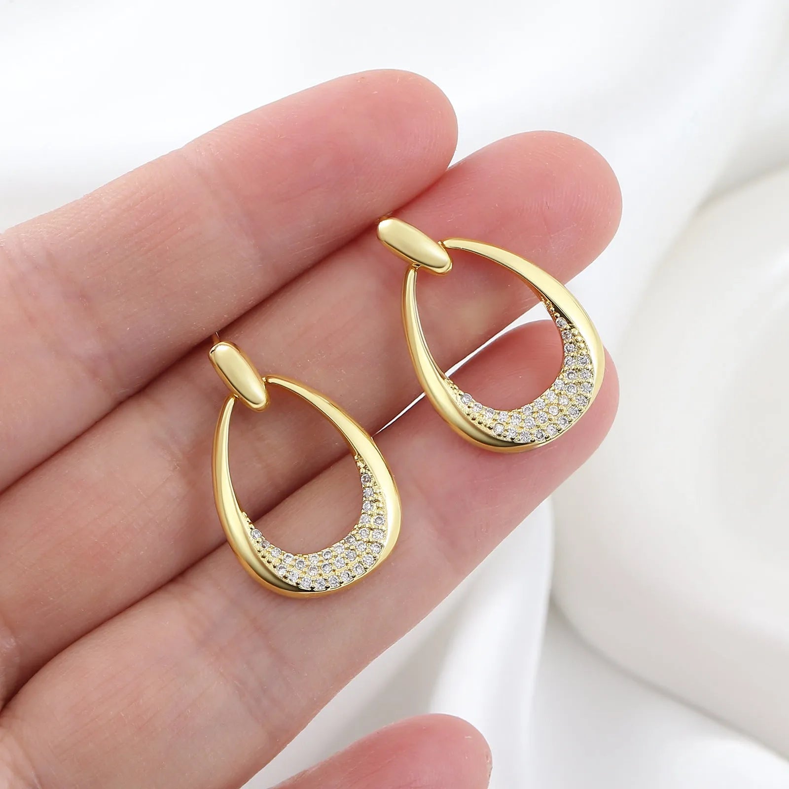 Yellow gold geometric drop earrings for women with zircon details, measuring 2.6cm by 1.7cm.