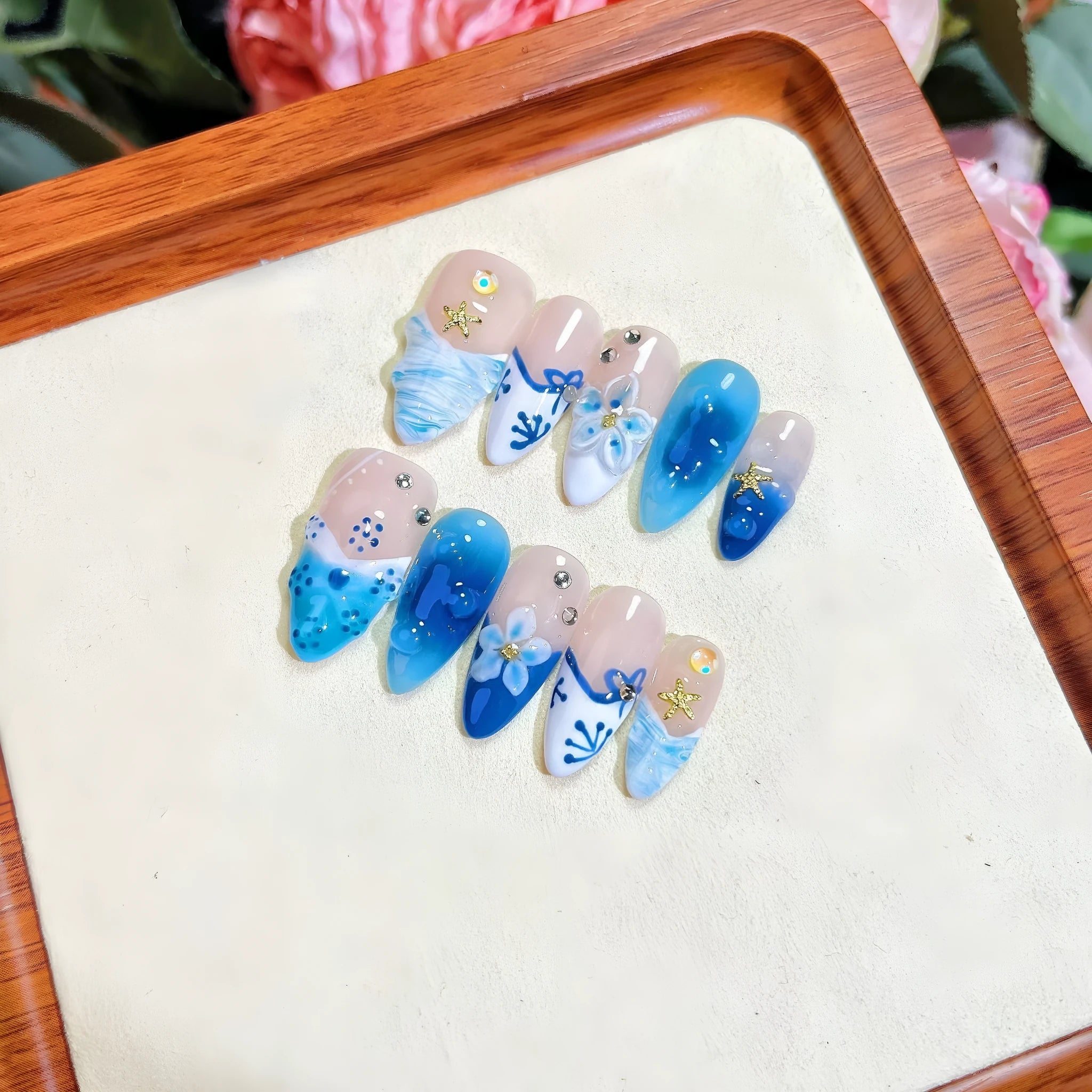Blue hand-painted carved summer ice transparent false nails in plastic wearable armour
