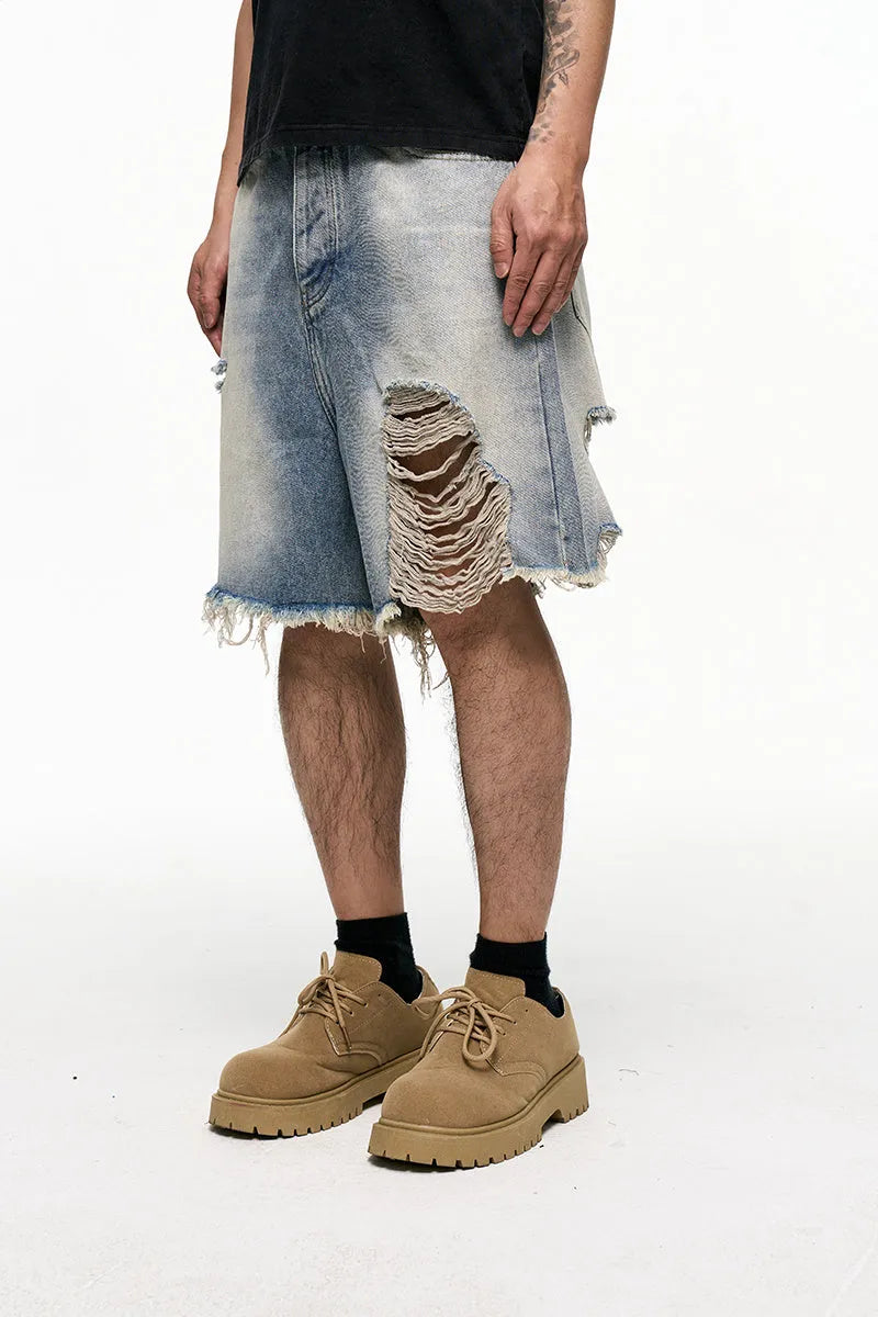 Light blue retro washed men's baggy denim shorts with a wide-leg cut and mid-waist.