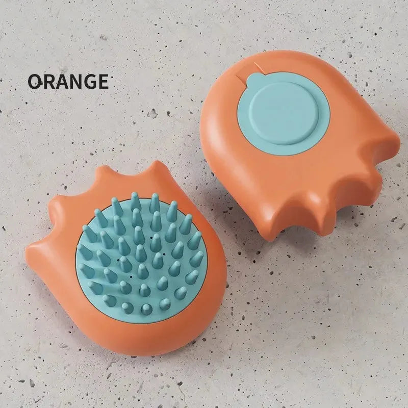 Blue pet bath brush with massage comb head and integrated shampoo box for washing dogs and cats.