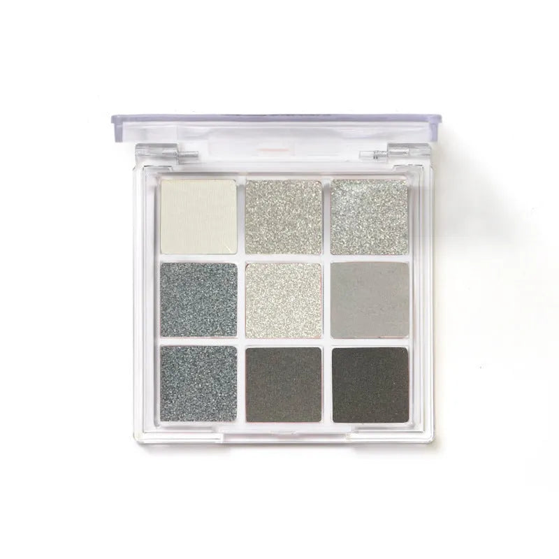 Smoked nine-colour eye shadow palette showing white, silver, black, and iron grey shades in CZ0069-9 compact