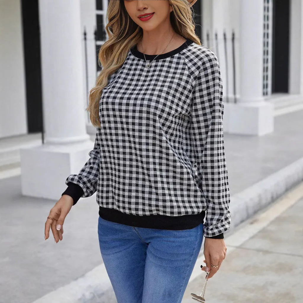 Black long sleeve pullover sweater with a Japanese sweet plaid striped pattern.