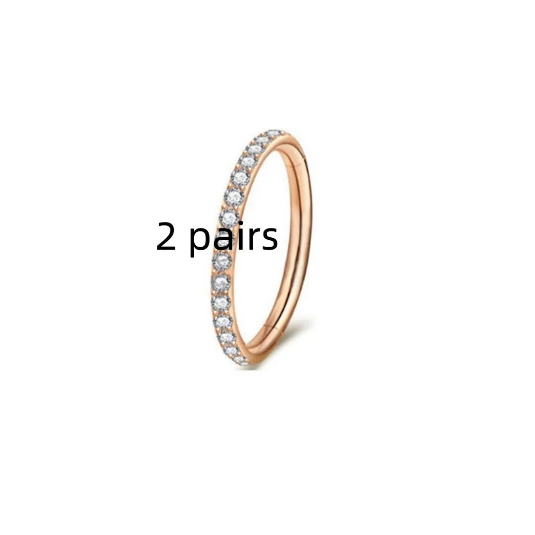 Stainless steel seamless nose ring jewellery showing colour options including gold, rose gold and black finishes