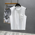 A black loose-fit cotton sleeveless t-shirt with a straight hem, laid flat.
