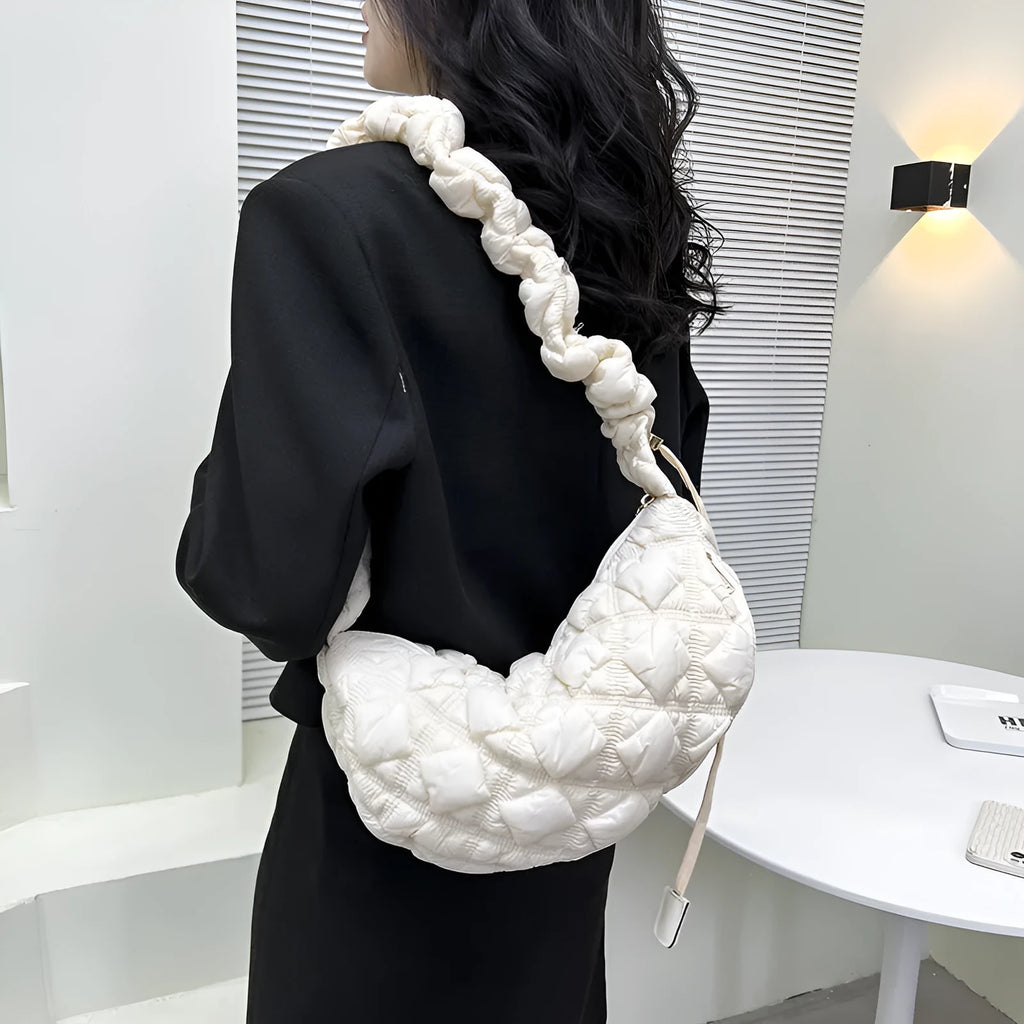 Women's casual nylon messenger bag in beige colour, showing front view with shoulder strap.
