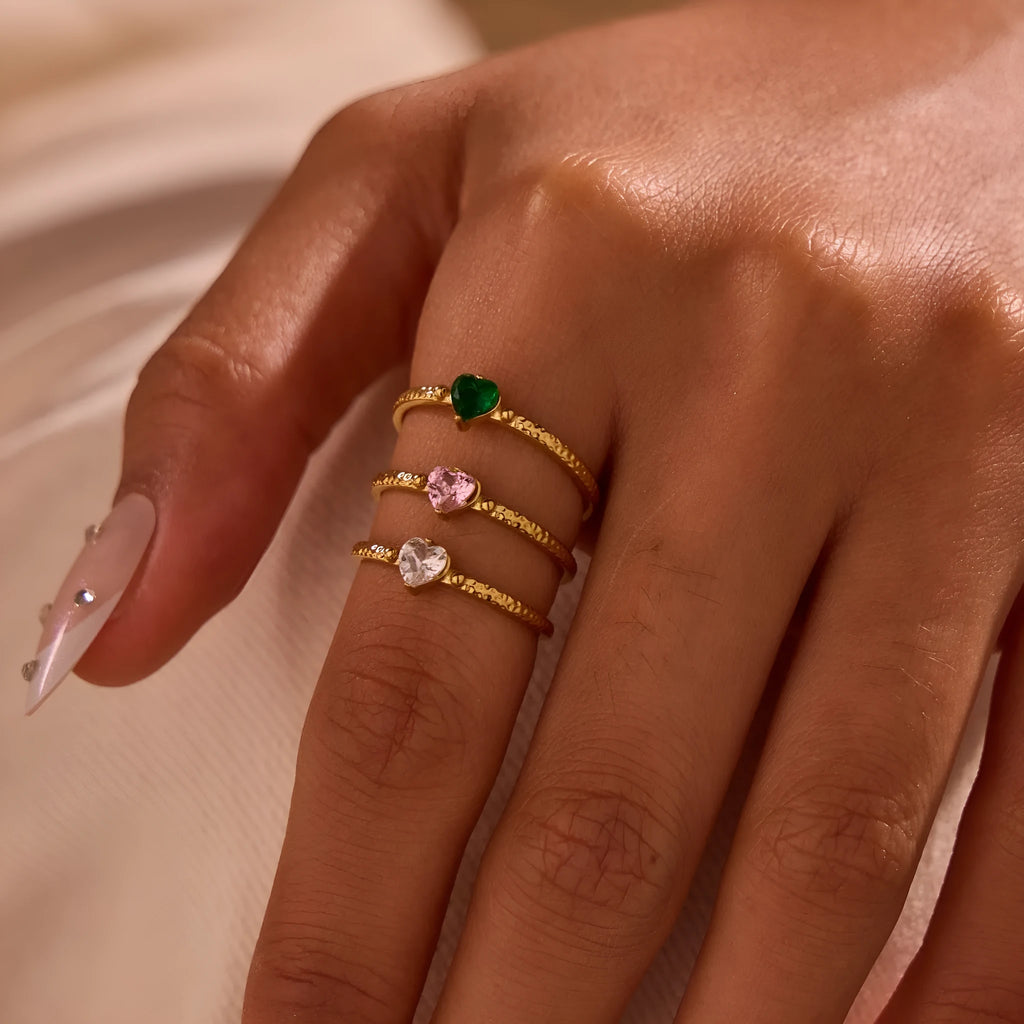 Open ended stainless steel ring with geometric setting and inlaid zircon love heart design in adjustable free size