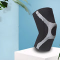 Red and grey silicone sports kneecaps for running and climbing protection