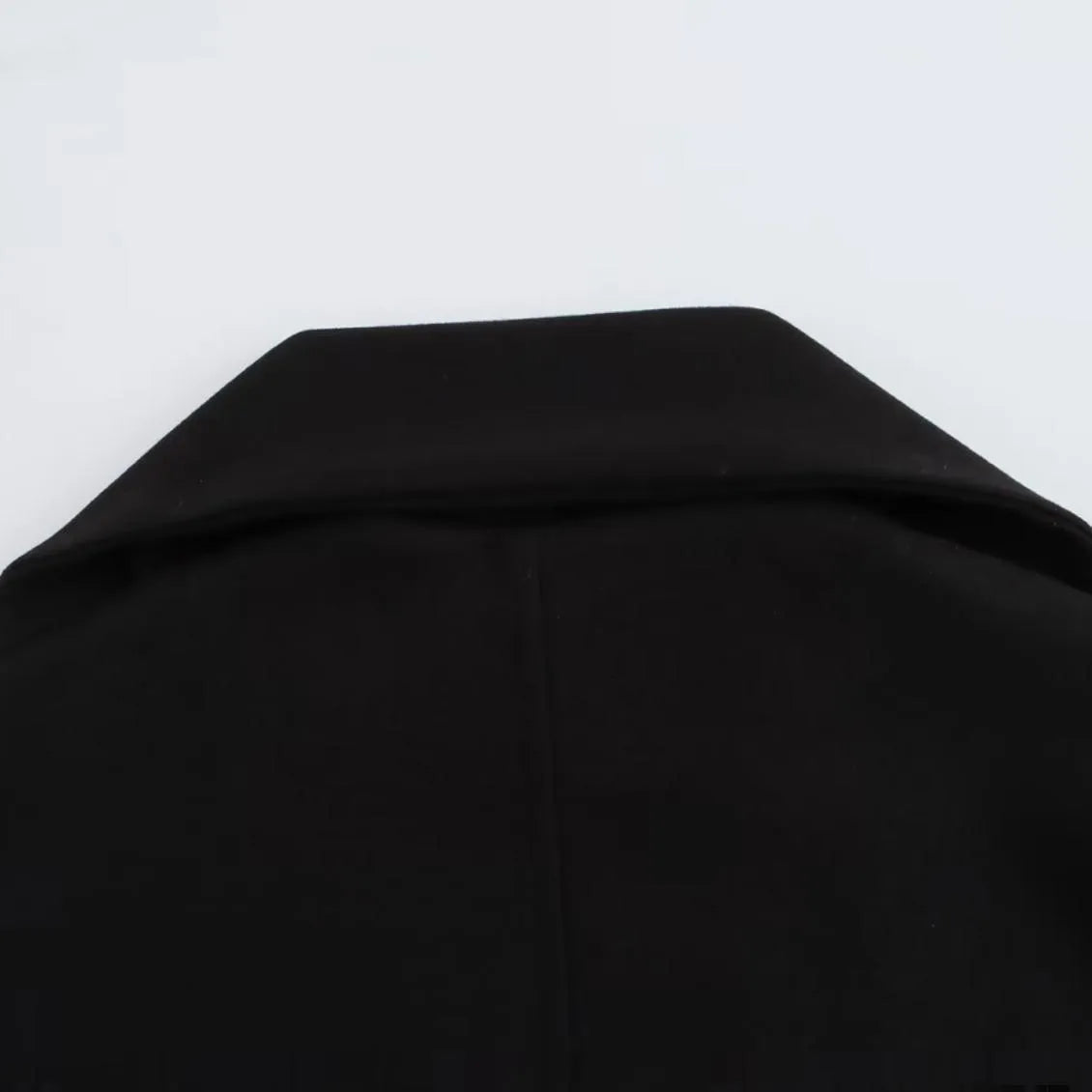 Women's longline overcoat with artificial fur collar in street fashion style