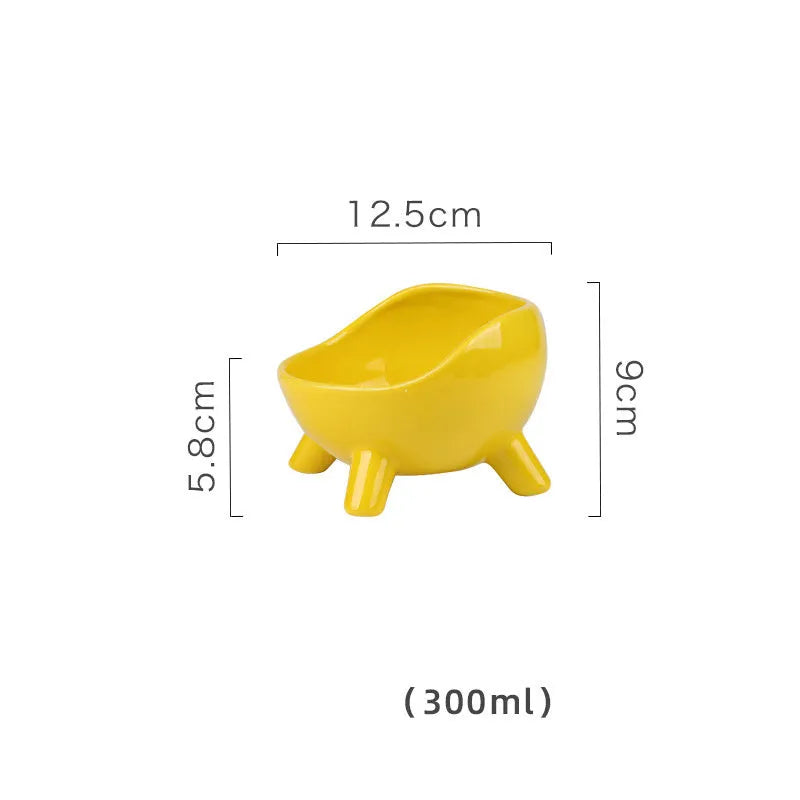 Green ceramic pet food bowl with four-legged stability design for cats and small dogs