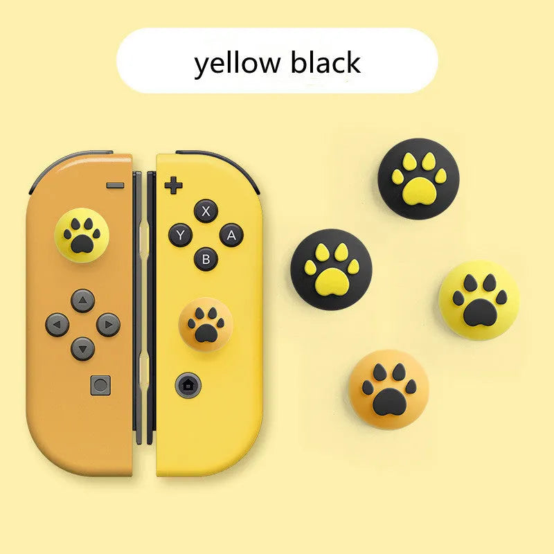 Four silicone rocker caps for Nintendo consoles in various colour combinations