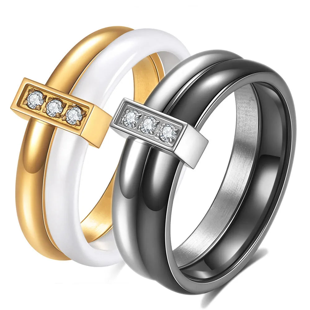 Women's geometric ceramic ring with glossy stitching and inlaid zirconium, in steel black or gold white.