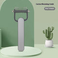 Green and grey pet hair unknotting comb with stainless steel teeth on PP handle