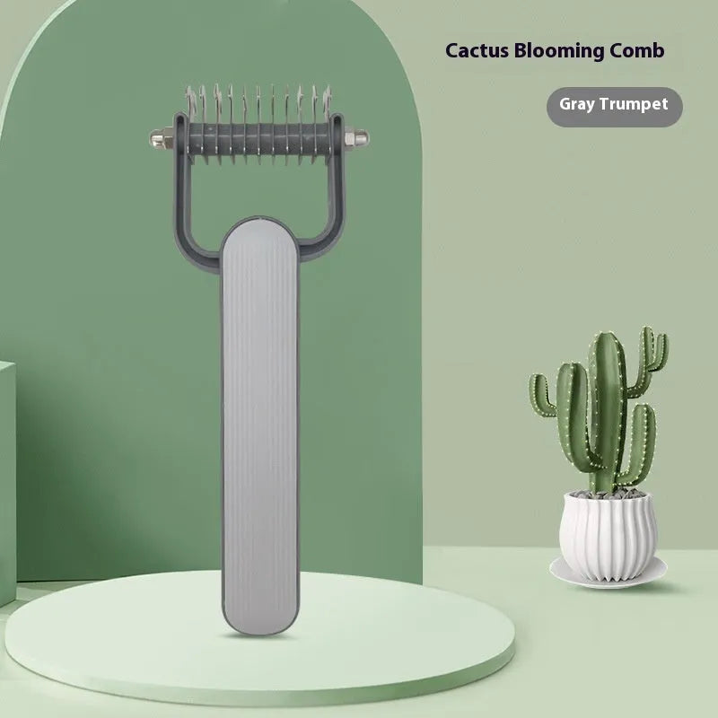 Green and grey pet hair unknotting comb with stainless steel teeth on PP handle