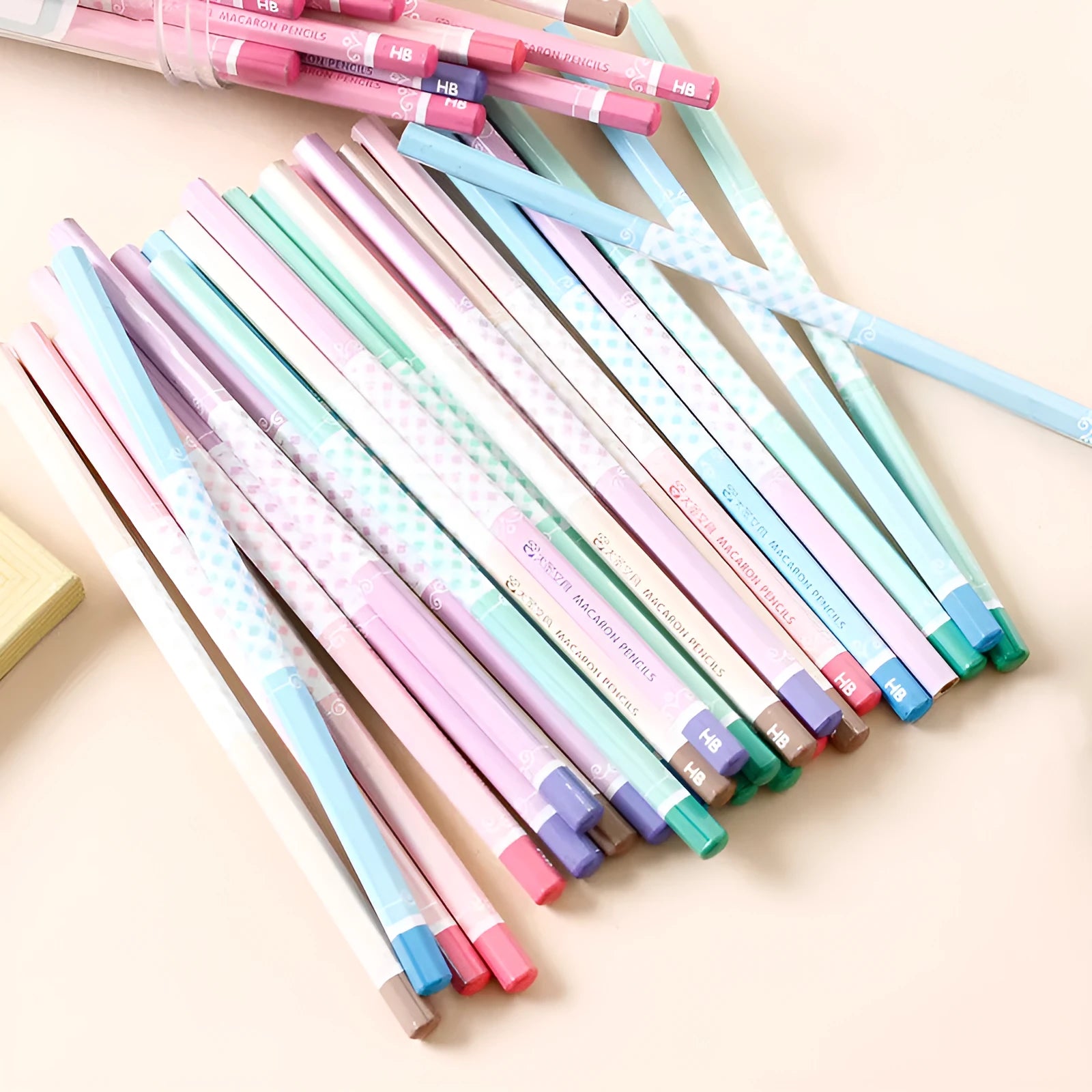 Pack of 50 hexagonal basswood pencils with HB graphite leads for drafting and writing.