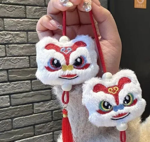 Chinese style plush lion tassel keychain ornament with star stone detail in blue or yellow