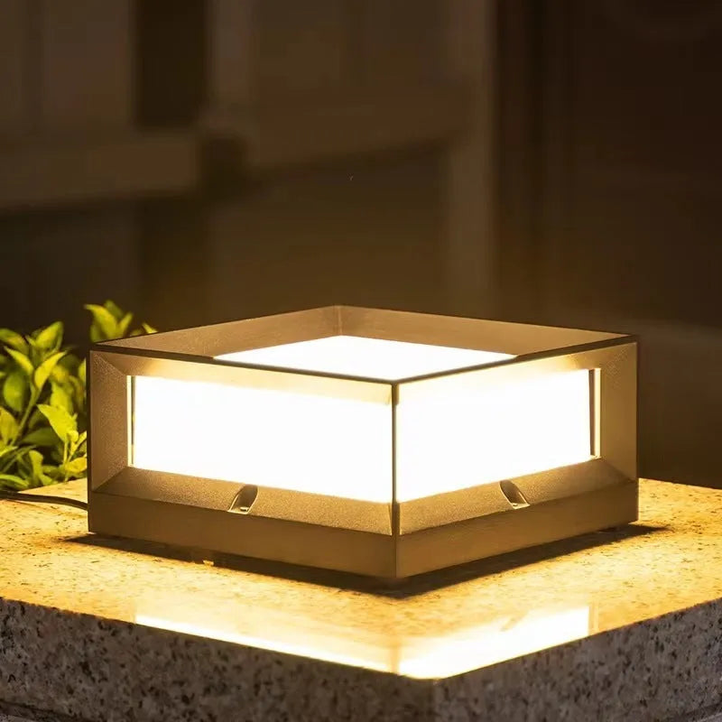 Silver aluminium solar-powered LED column light for outdoor wall mounting.
